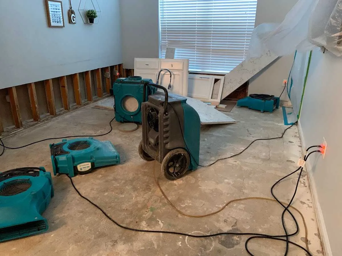 Dehumidifier in flood-cut room for Water Damage Restoration in Avenal